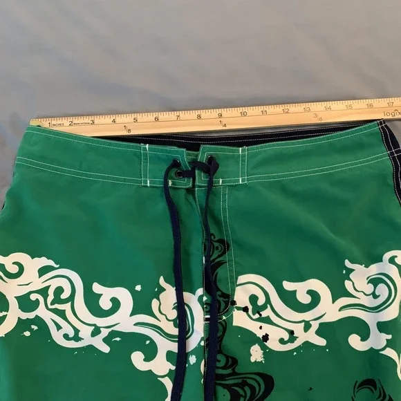 Genesis Surf Board Shorts Mens 34 Green Floral Face Graphic Swim Trunks Beach - Picture 4 of 10